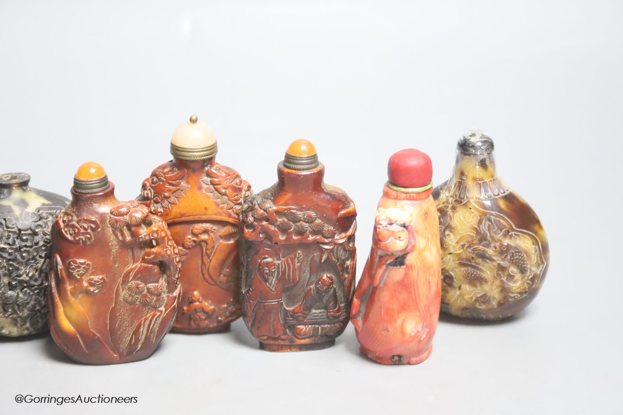 A collection of Chinese horn, tortoiseshell and coral etc. snuff bottles